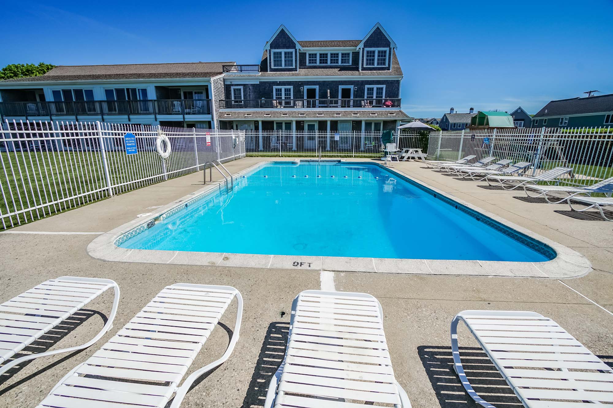 Photo of pool overlooking building exterior